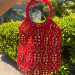 Red and gold summer clutch